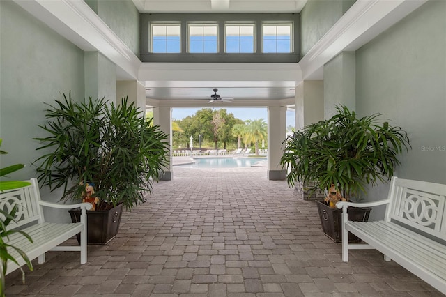 interior space featuring a patio and ceiling fan