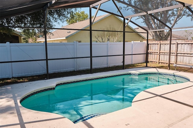2726 Randal Way, Kissimmee, FL 34743 - view of pool with a fenced backyard, a patio, and glass enclosure