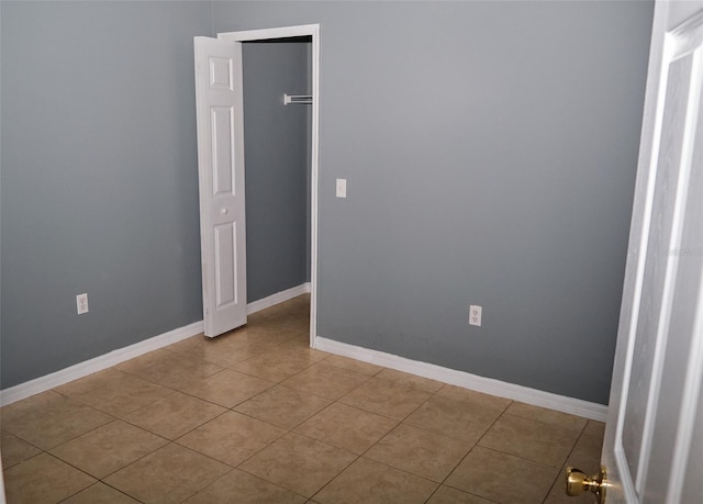 2726 Randal Way, Kissimmee, FL 34743 - unfurnished room with light tile patterned floors and baseboards