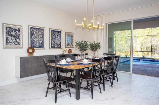 tiled dining room featuring a chandelier