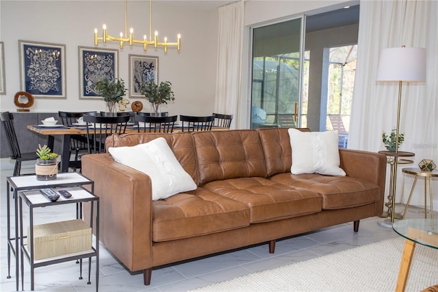 tiled living room featuring a chandelier