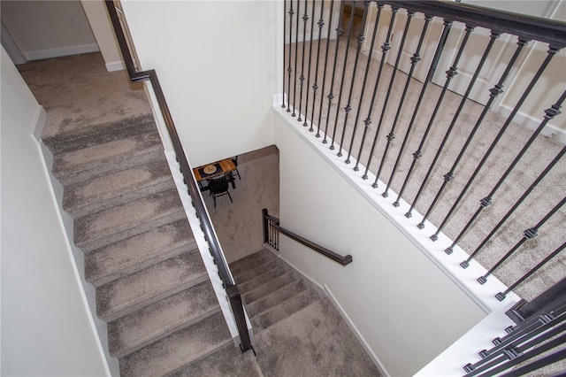 stairway with carpet floors