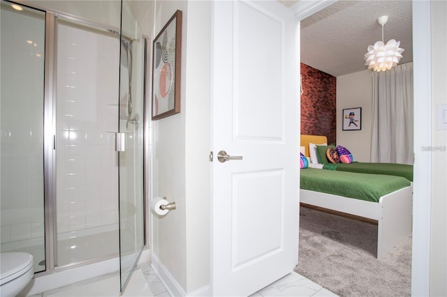 bathroom with an enclosed shower, tile flooring, a textured ceiling, and toilet