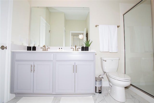 bathroom with tile floors, a shower with door, toilet, and vanity