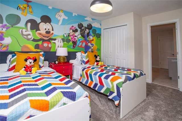 carpeted bedroom with a closet