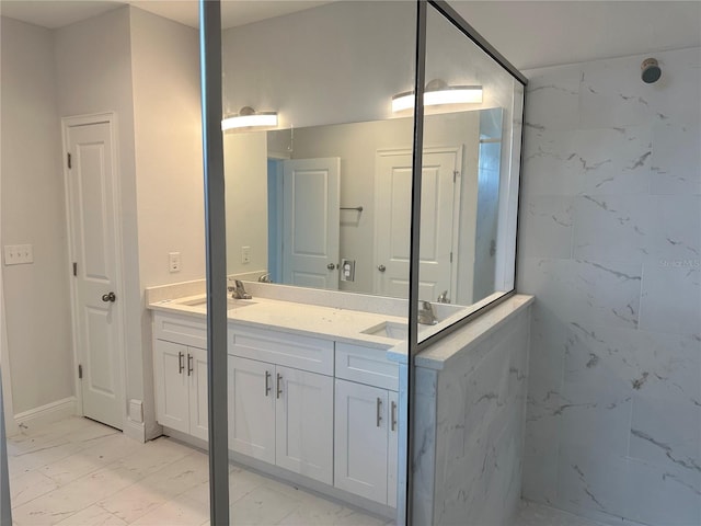 bathroom featuring tile flooring and vanity