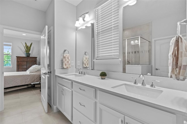 bathroom with tile floors and dual bowl vanity