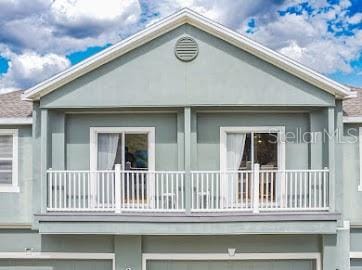 view of property exterior with a balcony