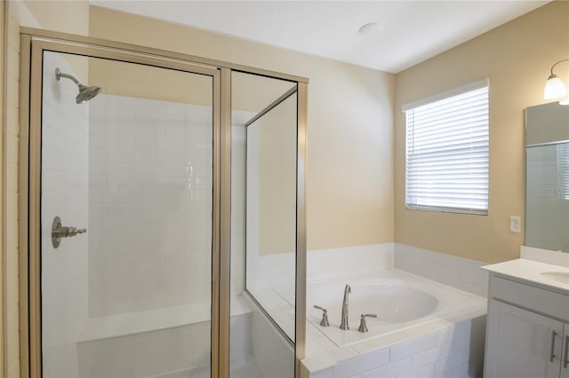 bathroom with vanity and plus walk in shower