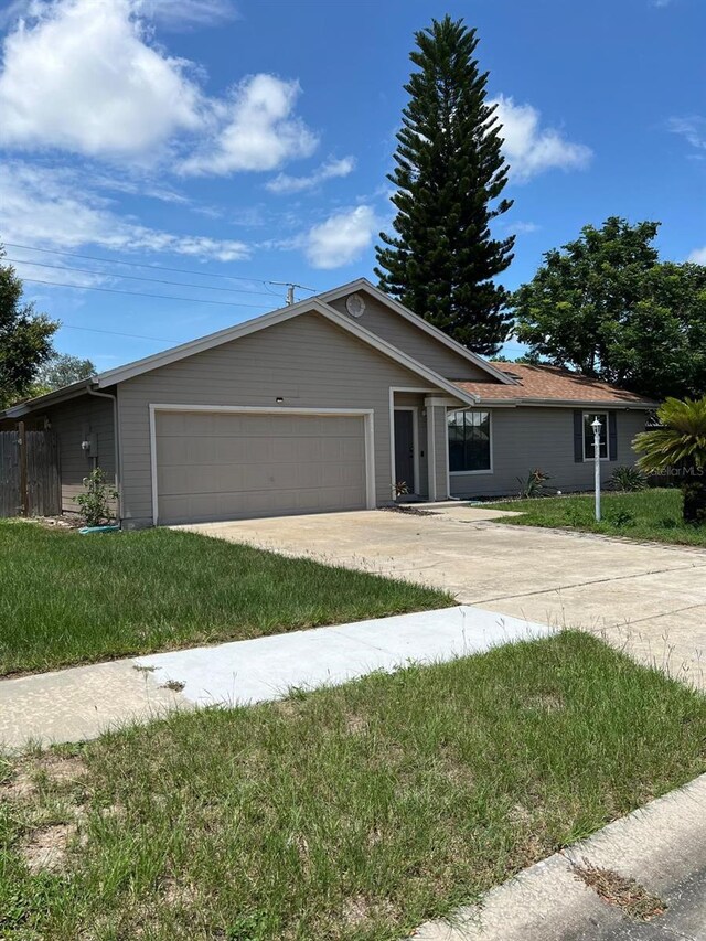 single story home with a garage