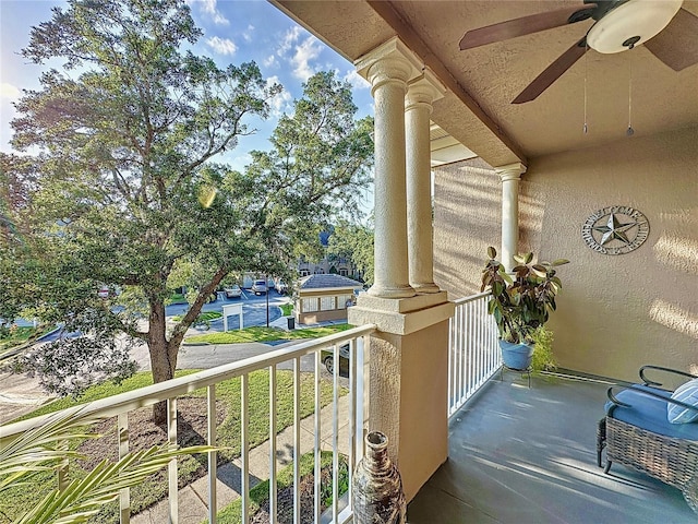 balcony featuring ceiling fan