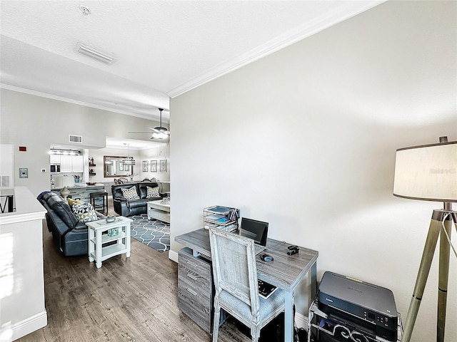 office space featuring ornamental molding, a textured ceiling, ceiling fan, and hardwood / wood-style floors