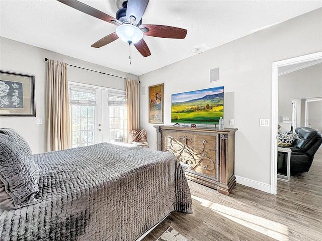 bedroom with french doors, ceiling fan, light wood-type flooring, and access to outside