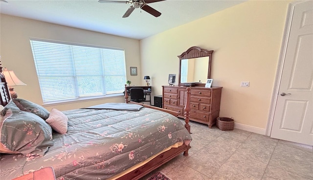 tiled bedroom with ceiling fan