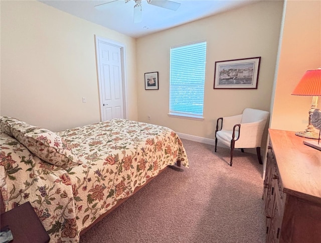 bedroom featuring ceiling fan and carpet flooring