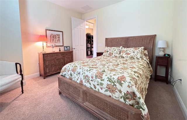 bedroom featuring carpet