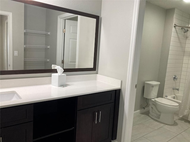 full bathroom featuring tiled shower / bath, toilet, tile flooring, and vanity