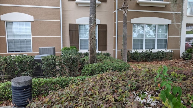 property entrance with central AC unit