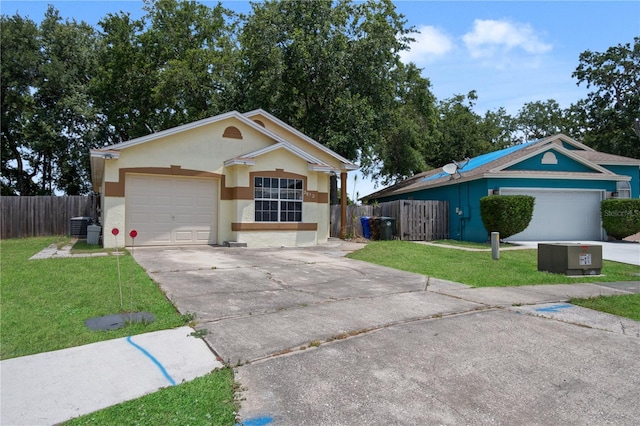 single story home featuring a garage, central AC unit, and a front lawn