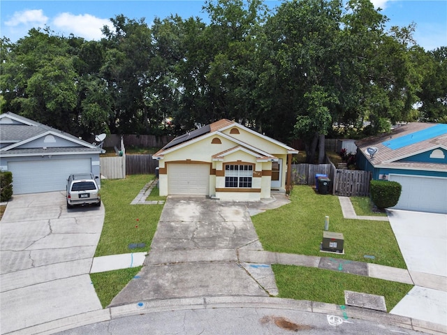 single story home with a front yard