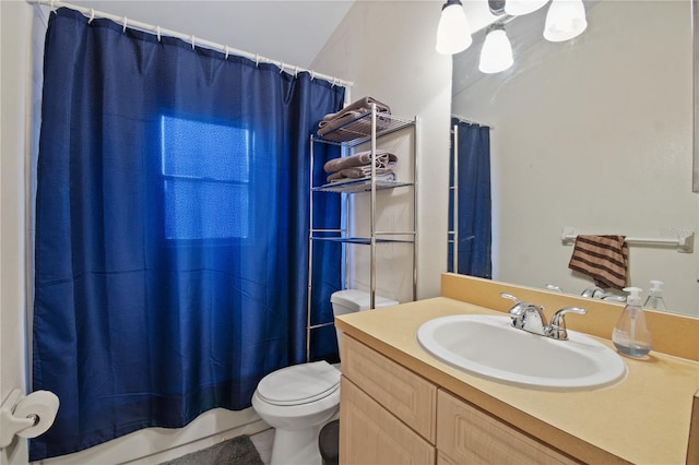 full bathroom with vanity, toilet, and shower / tub combo with curtain