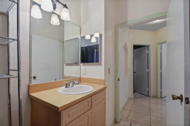 bathroom featuring vanity and tile patterned flooring