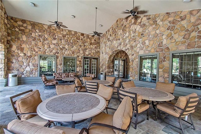 view of patio featuring ceiling fan