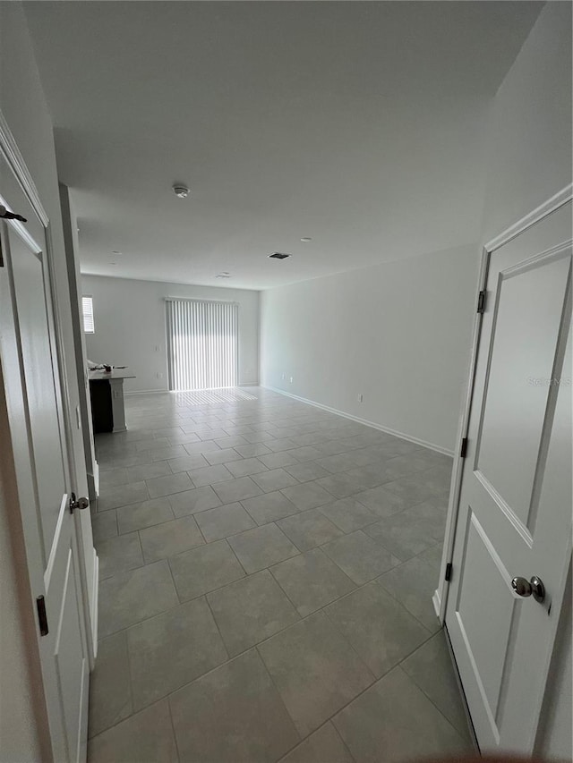 view of tiled spare room