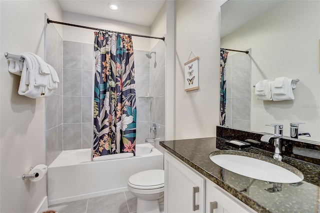 full bathroom with tile patterned floors, vanity, shower / bath combo, and toilet