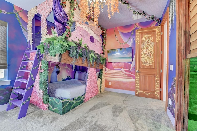 bedroom with carpet floors and a textured ceiling