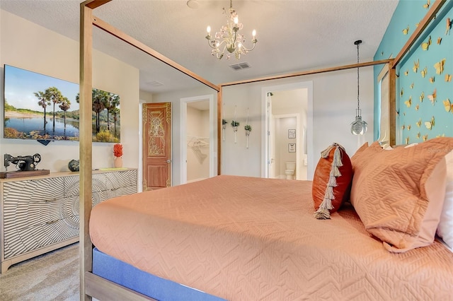 bedroom with carpet, a chandelier, and a textured ceiling