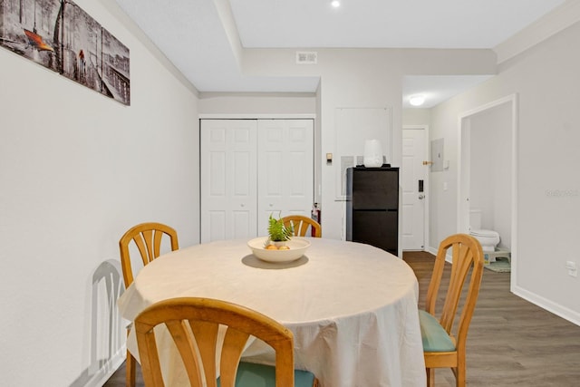 dining area featuring hardwood / wood-style floors