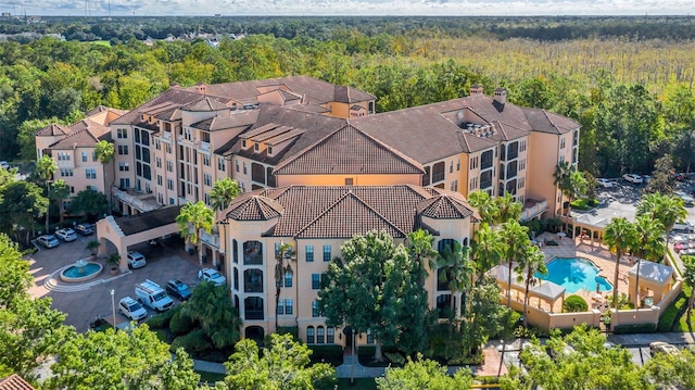 aerial view with a wooded view