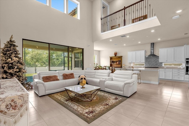 tiled living room with a healthy amount of sunlight