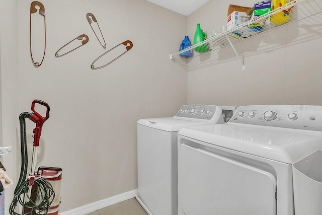 laundry room featuring washer and clothes dryer