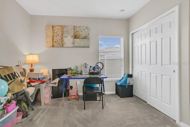 office space with light colored carpet