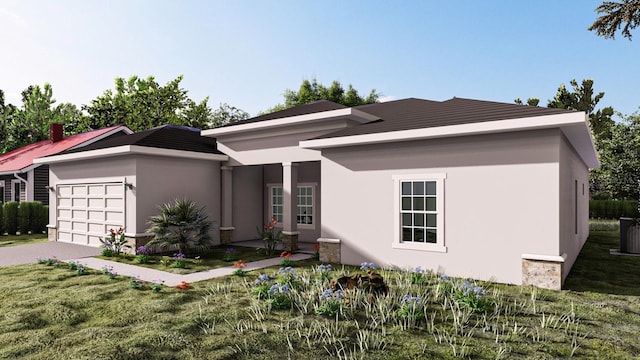 view of front of property with a garage and a front yard