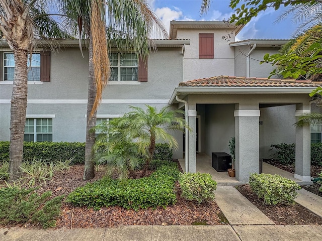 multi unit property featuring a patio area