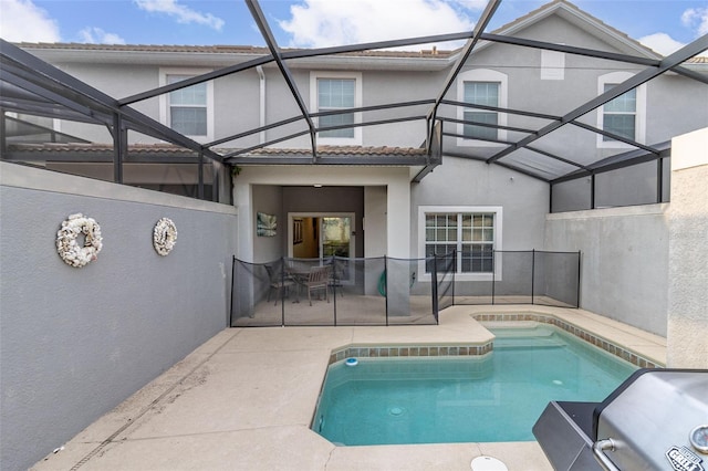 view of pool featuring a patio and a lanai