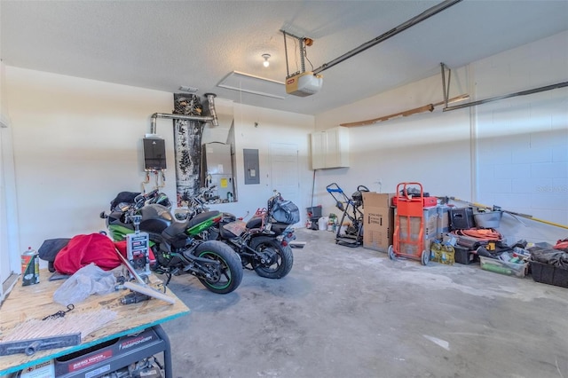 garage featuring electric panel and a garage door opener