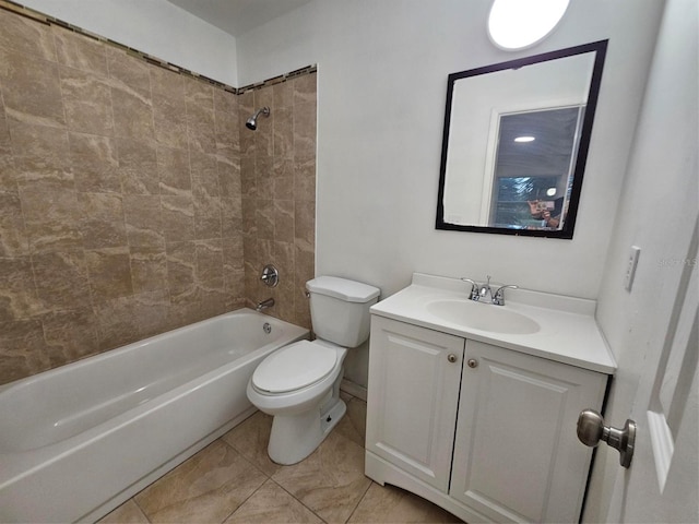 full bathroom featuring tile patterned floors, vanity, toilet, and tiled shower / bath