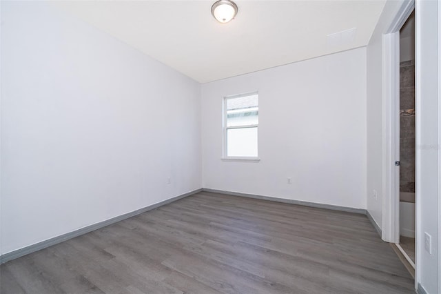 unfurnished bedroom featuring hardwood / wood-style floors