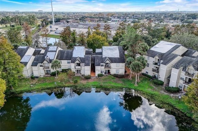 drone / aerial view with a water view