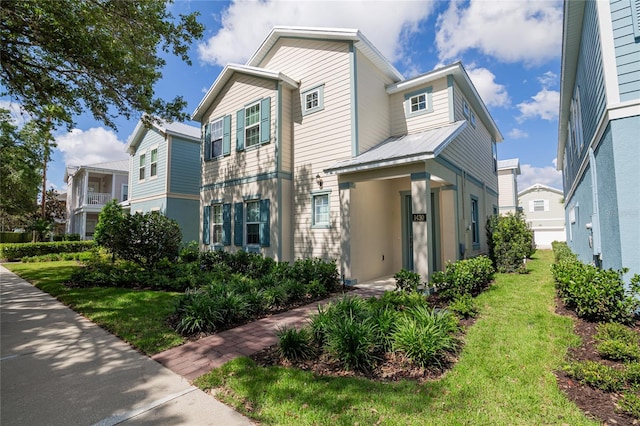 view of front of property with a front lawn