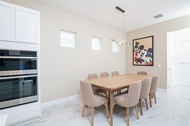 view of tiled dining area