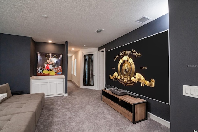 interior space featuring a textured ceiling and carpet floors