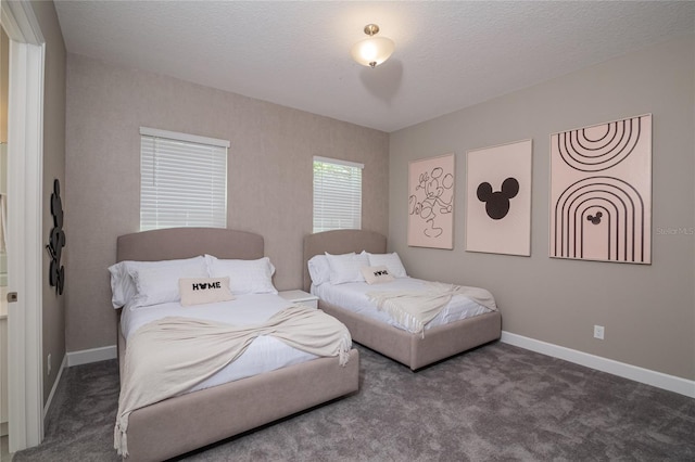 carpeted bedroom with a textured ceiling