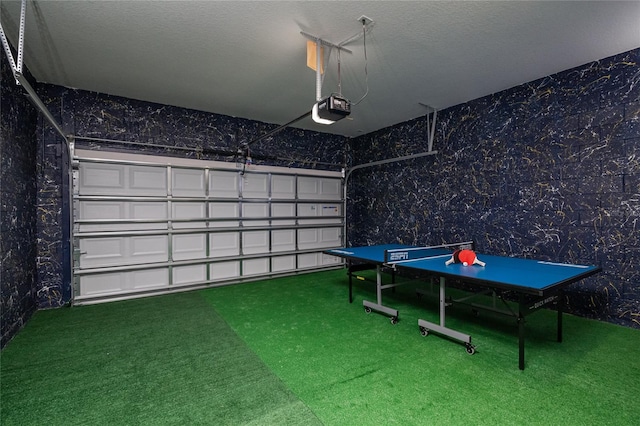 recreation room with carpet flooring