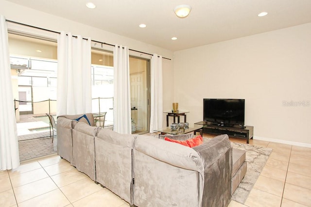 living room featuring light tile patterned flooring