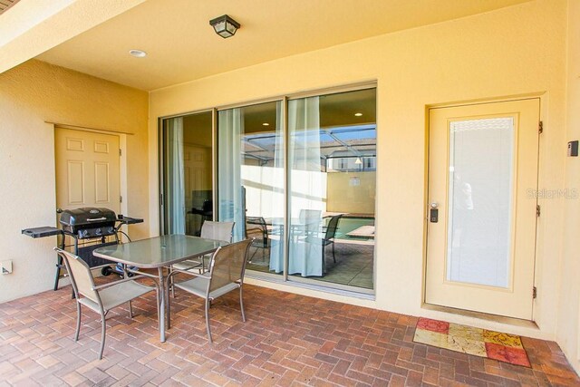 view of patio featuring a grill